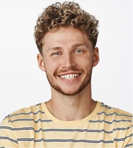 Portrait d’un homme souriant, membre de l’équipe Colette Sport